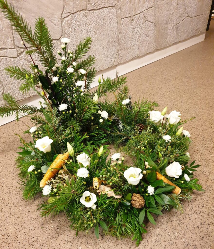 Urndekoration. Junsele blomsterbutik. 